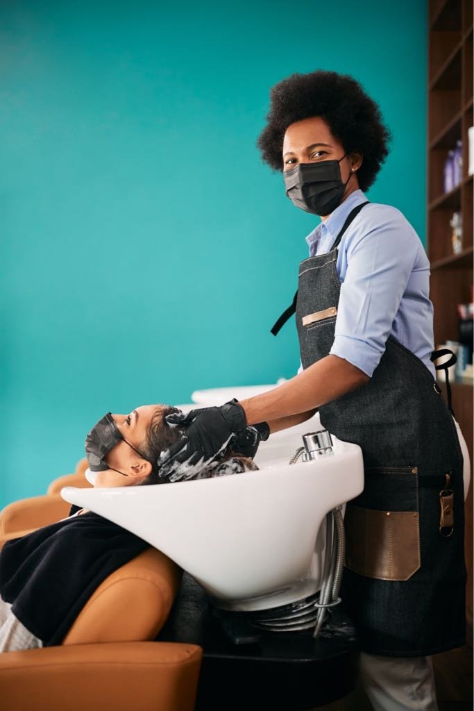 black-hairdresser-wearing-face-mask-while-washing-2024-12-13-18-21-43-utc_Medium